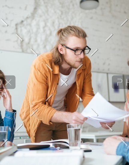 demo-attachment-545-group-of-upset-students-sitting-at-the-table-with-E5YW9L4-1